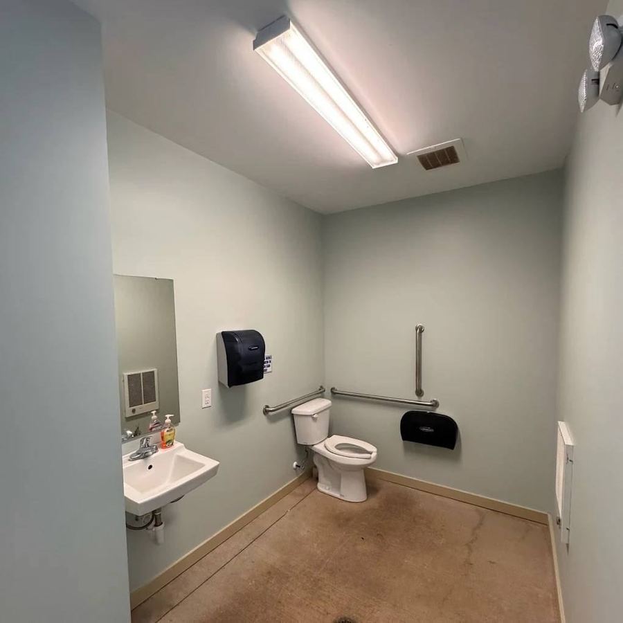 Commercial restroom with freshly painted walls
