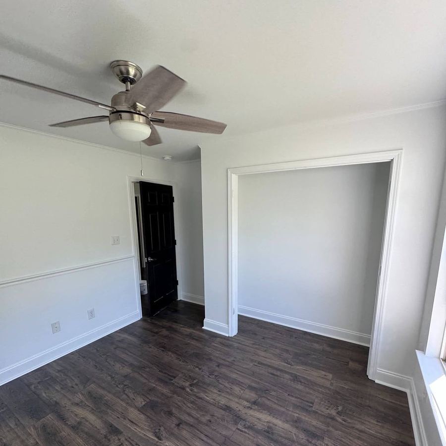 Freshly painted bedroom walls and trim in an Upstate home